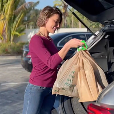 Shopping Pal helping bring in bags